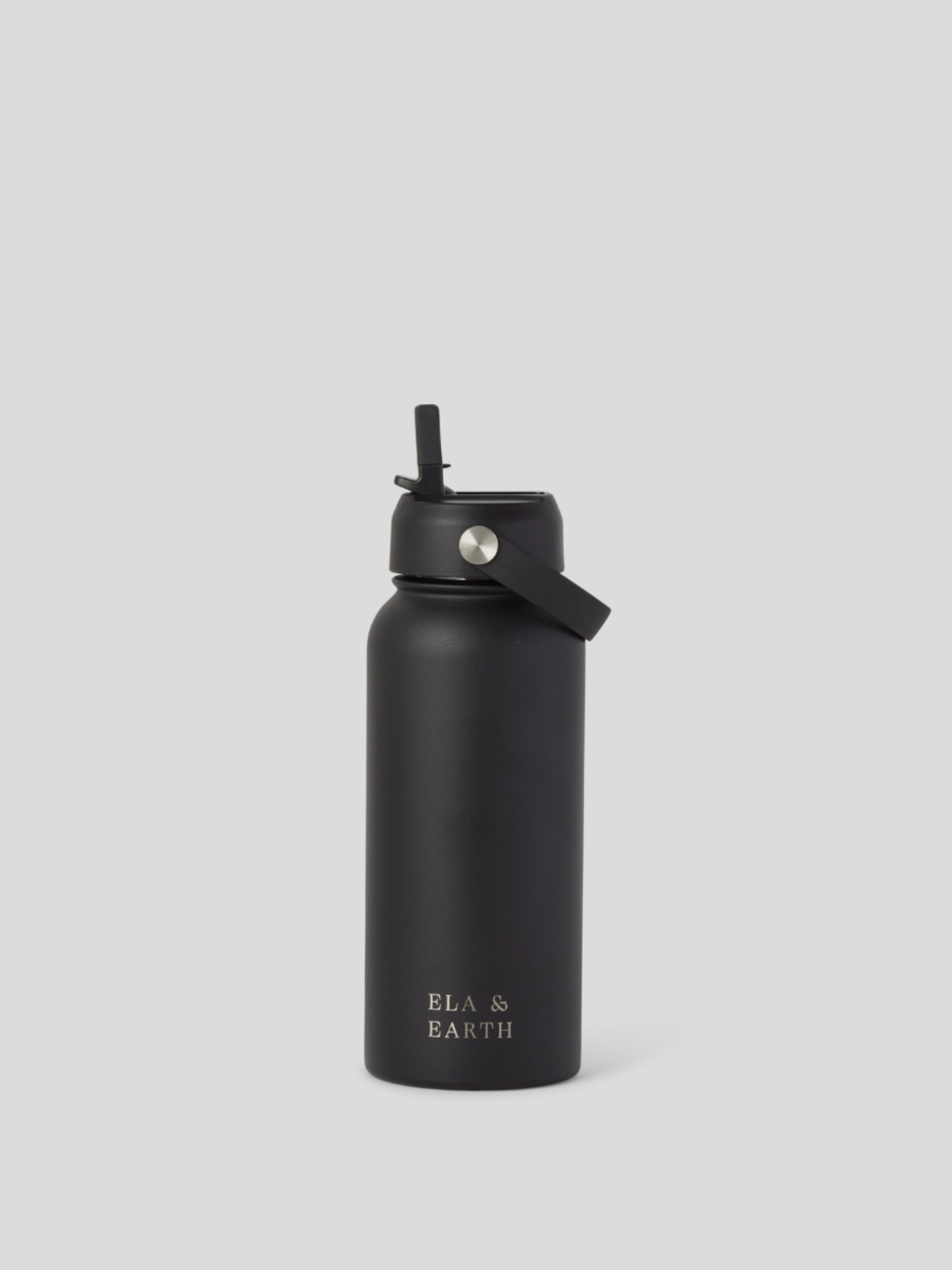 Black water bottle with straw lid on a light gray background