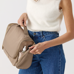 Model Holding a toiletries bag 