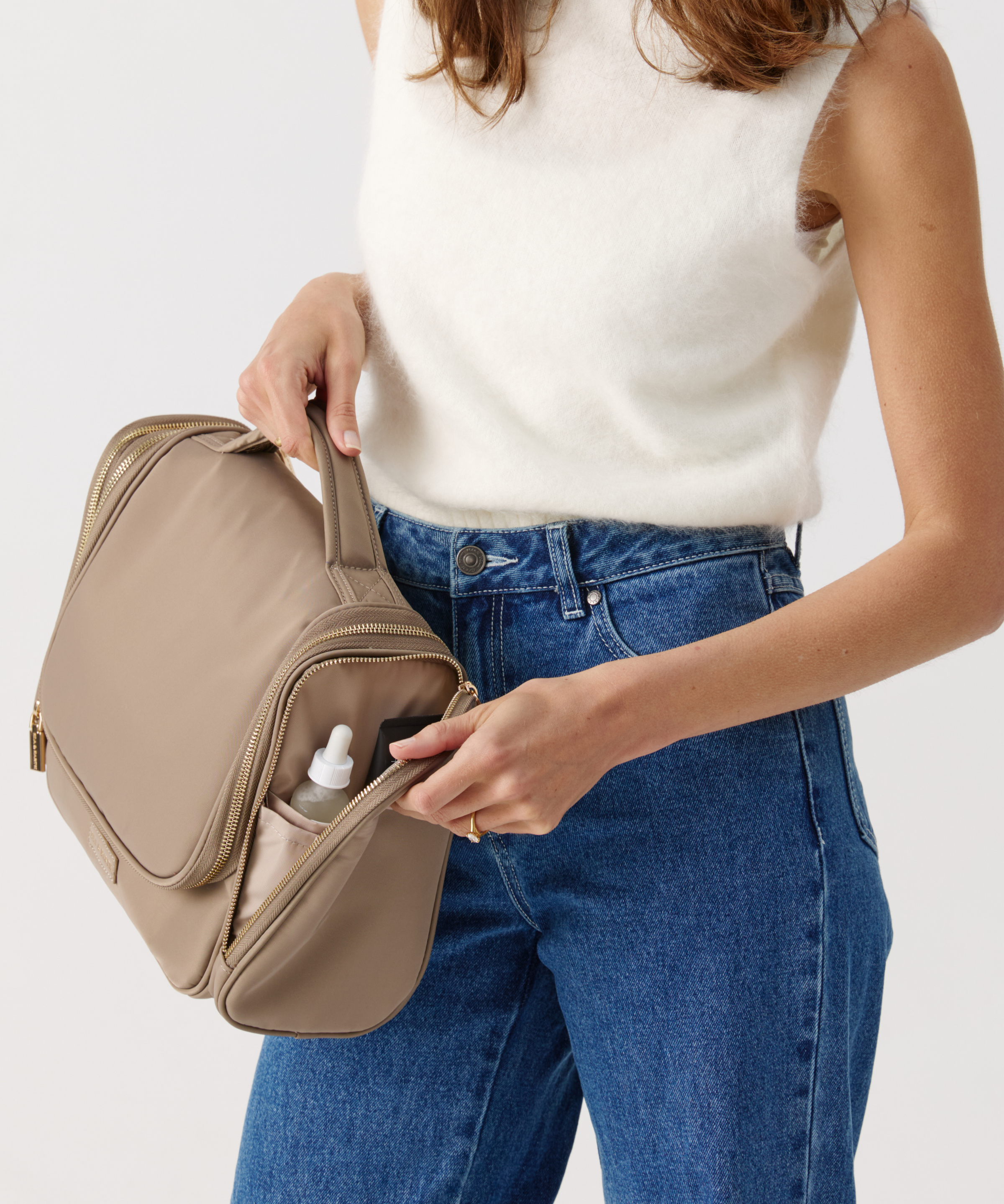 Model Holding a toiletries bag 