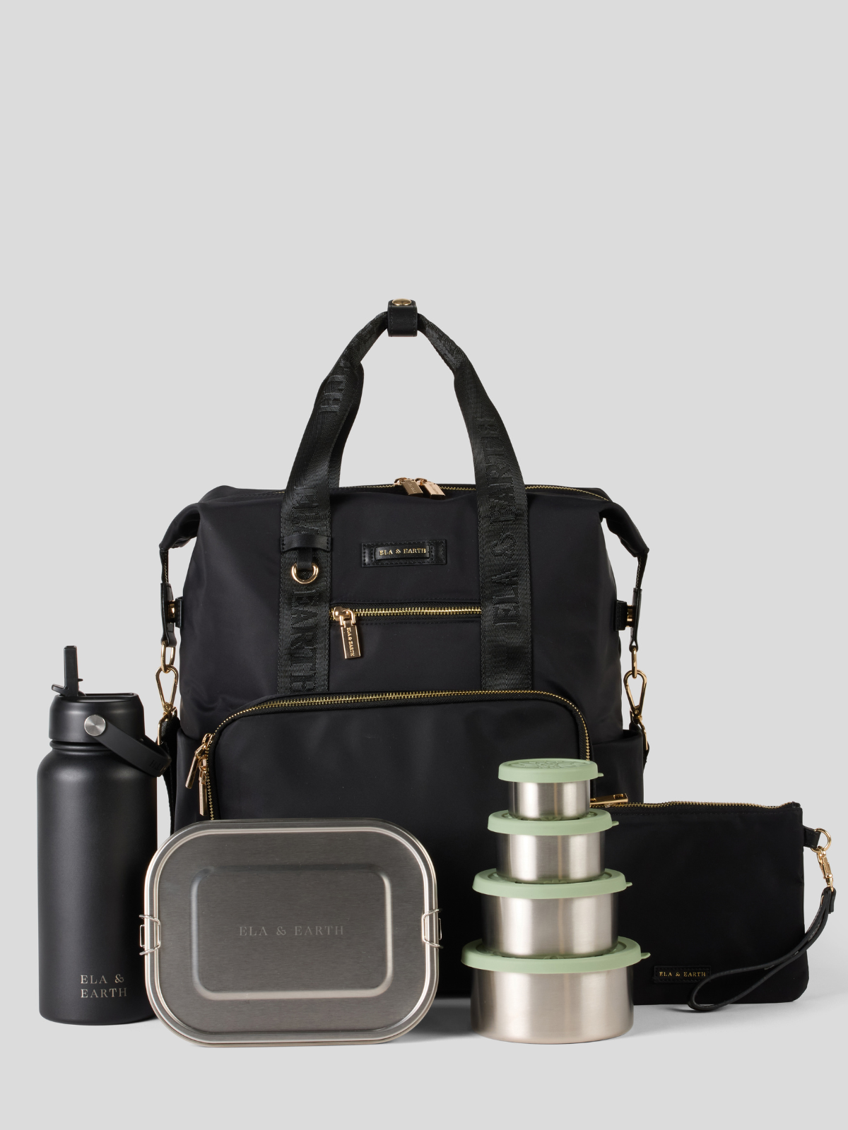Black backpack with travel accessories including a water bottle, lunch box, and containers on a light gray background