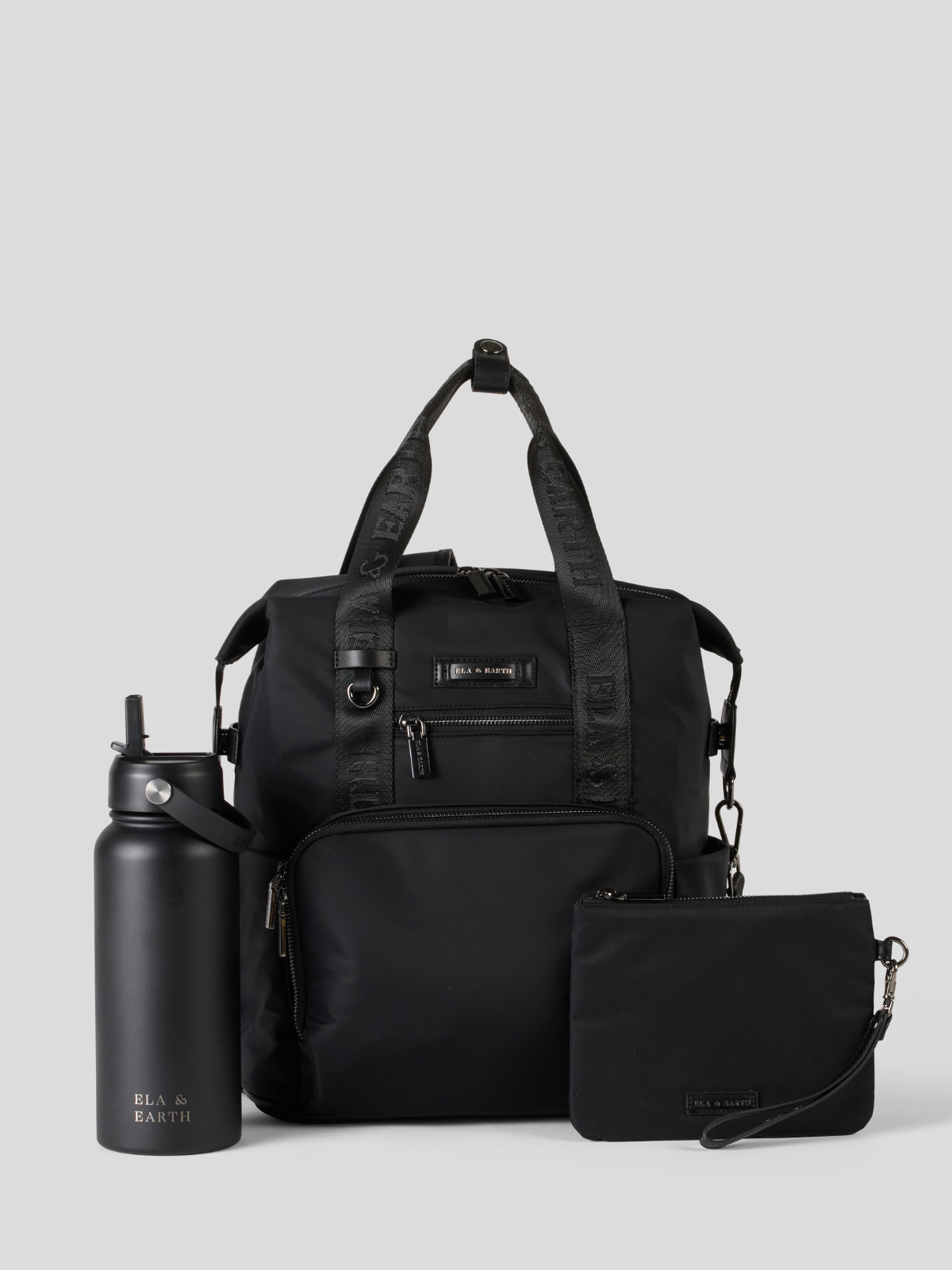 Black backpack, water bottle, and pouch on a light gray background