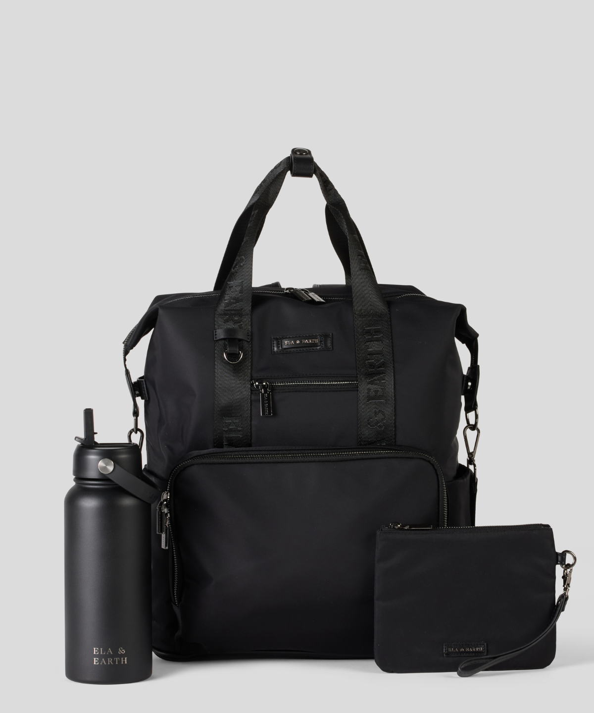 Black Backpack with a smaller pouch and water bottle on a light gray background