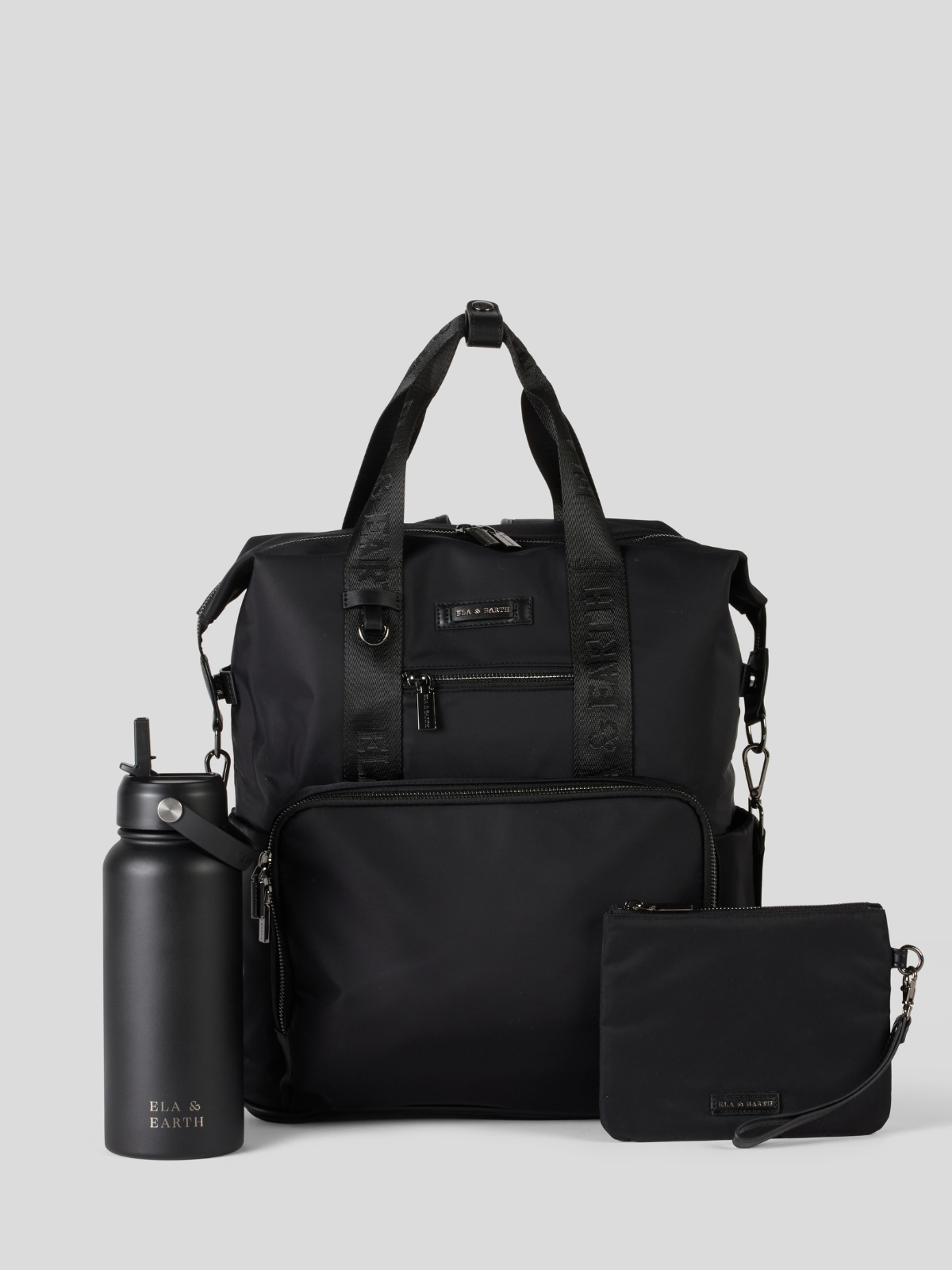 Black Backpack with a smaller pouch and water bottle on a light gray background