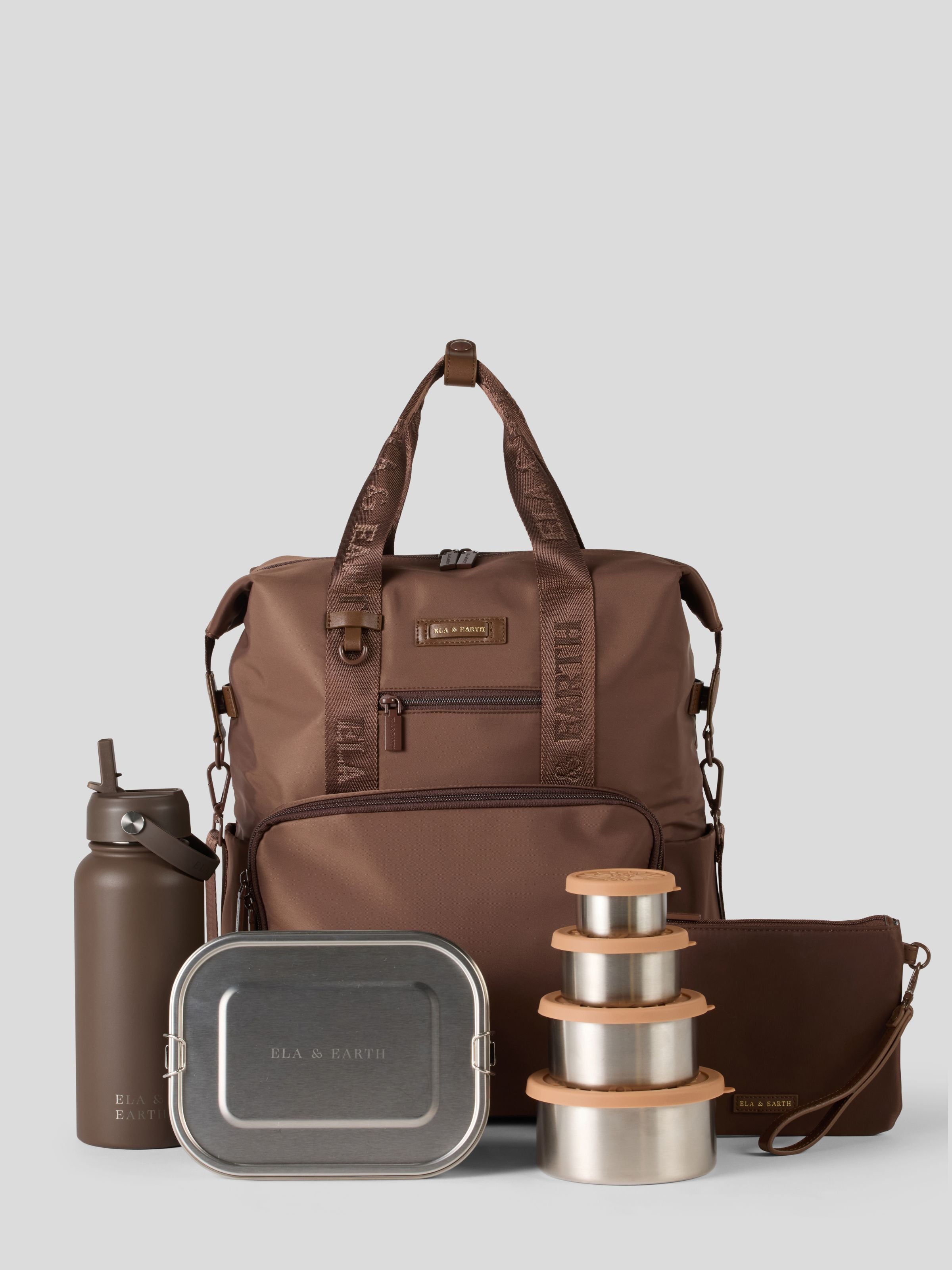 Cocoa backpack with water bottle, lunch box, and containers on a light gray background