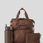 Cocoa Backpack with matching water bottle and pouch on a light gray background