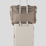 Oyster Overnight travel on a suitcase 