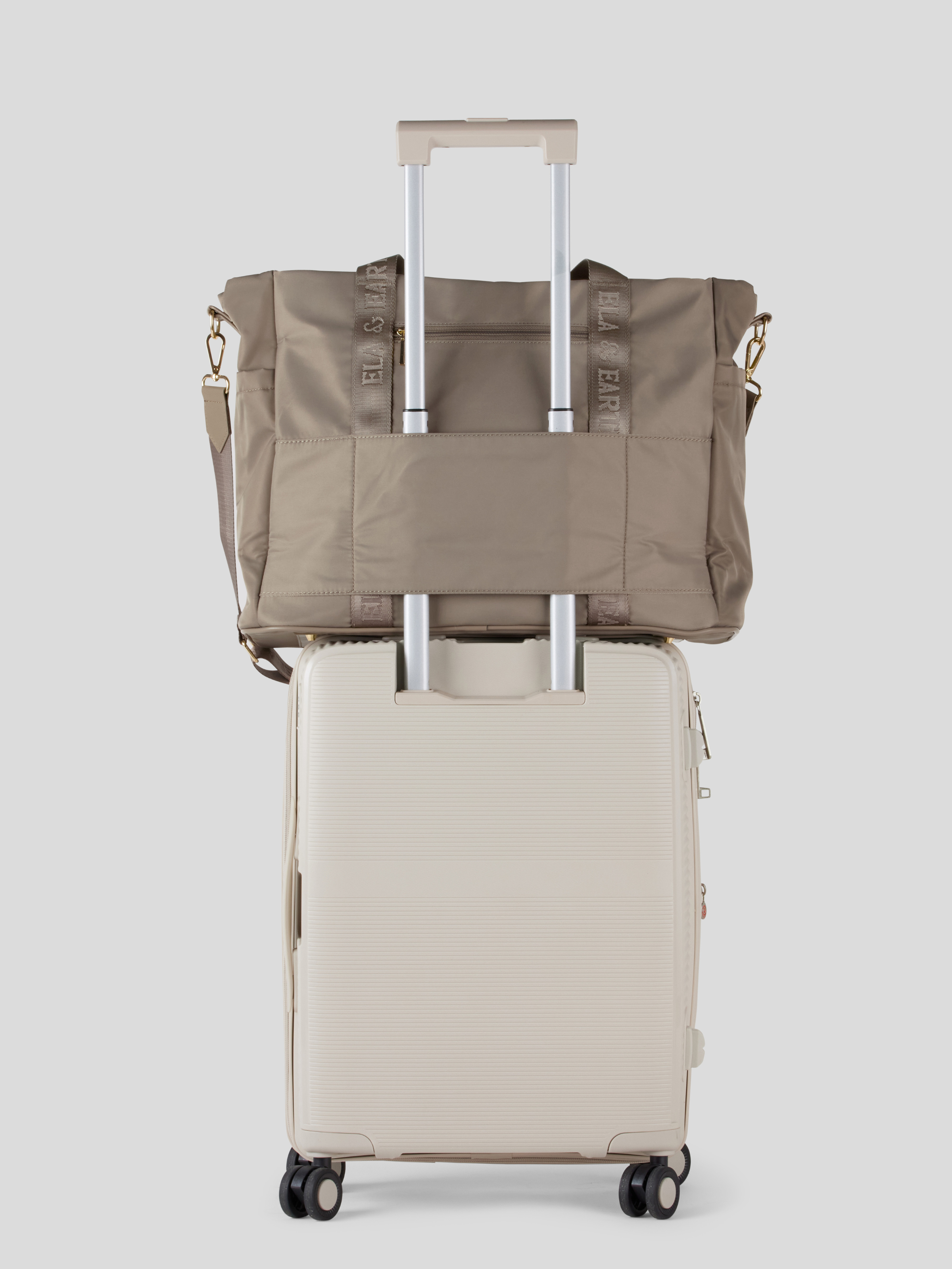 Oyster Overnight travel on a suitcase 
