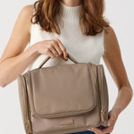 Model holding Toiletries Bag 