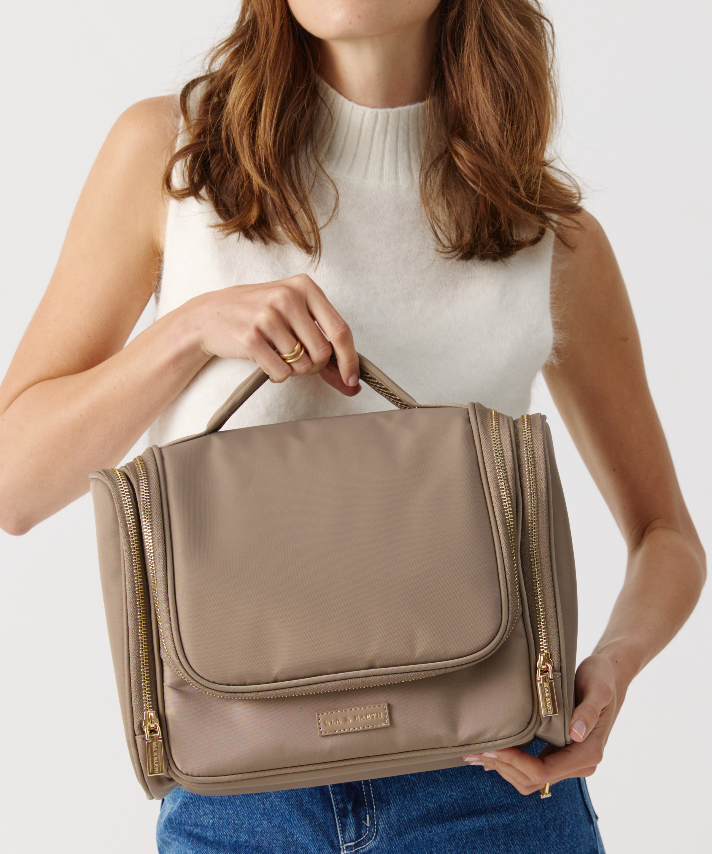 Model holding Toiletries Bag 