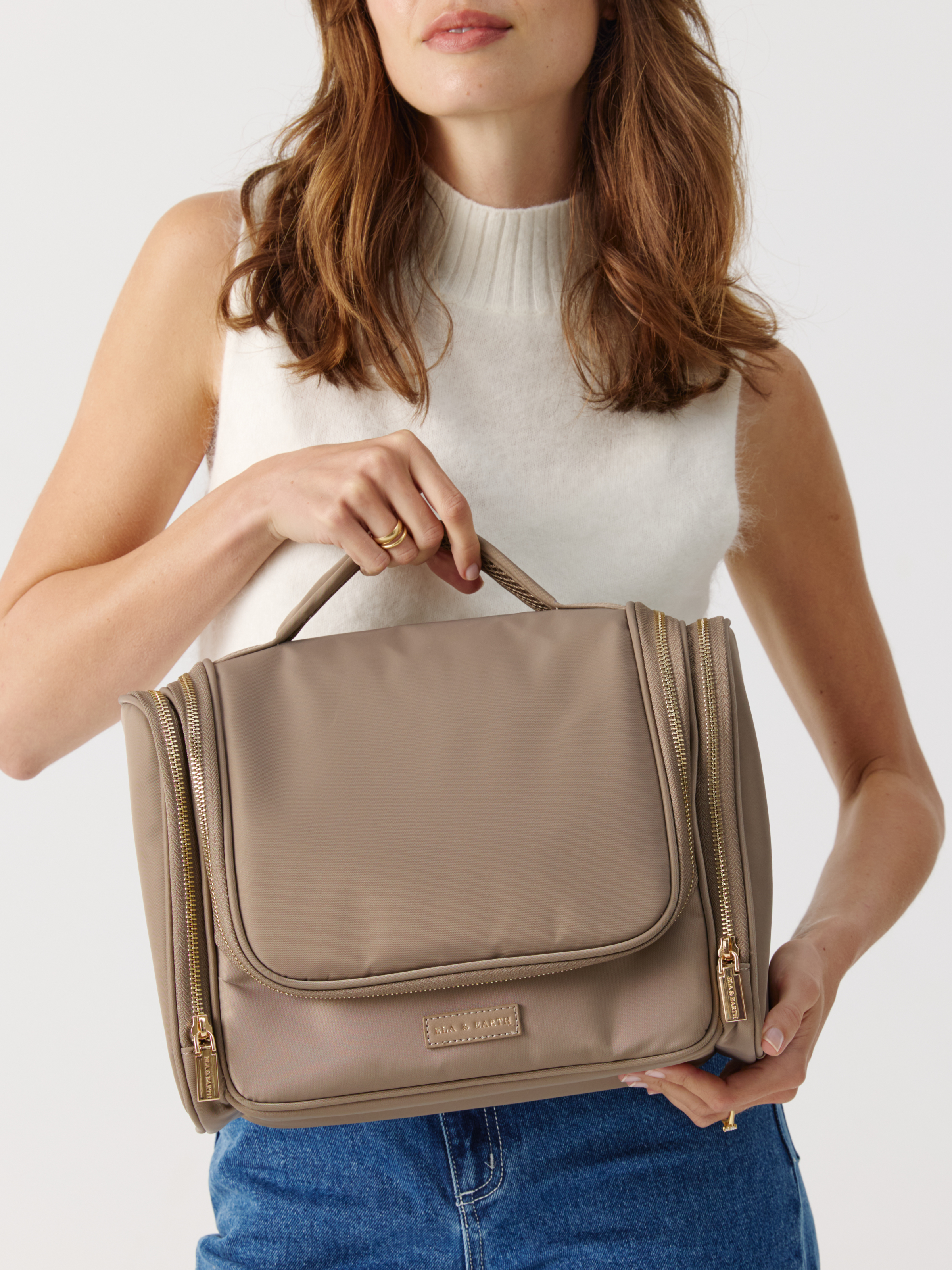 Model holding Toiletries Bag 