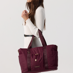 Model holding a Shiraz tote Bag 