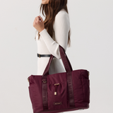 Model holding a Shiraz tote Bag 